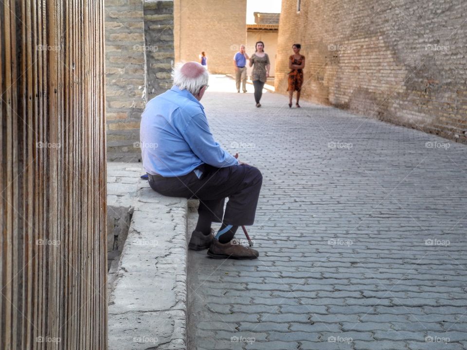 If I could drop 20 years off... I took this picture in Khiva. I saw this old man resting and just waited when he would look at those young women. Then I pushed a button. 