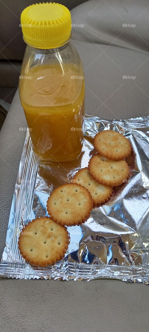 Biscuits meal with mango juice