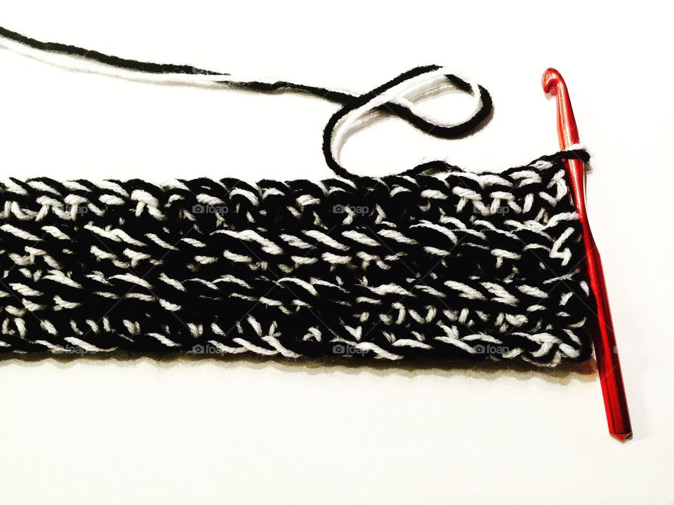 Crocheting with black and white yarn