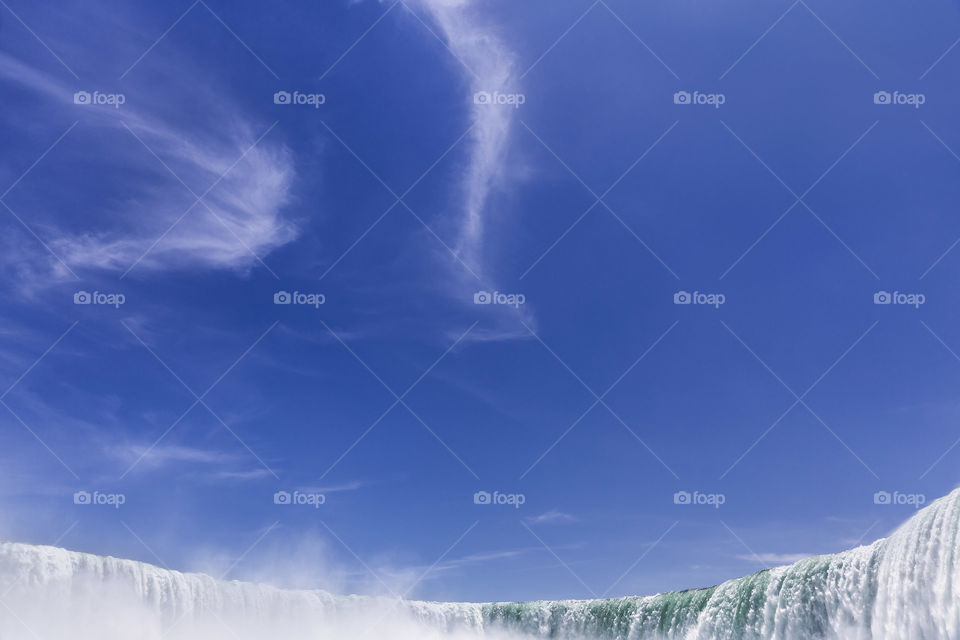 Waterfall . Natural waterfall with sky background.. Looking awesome 