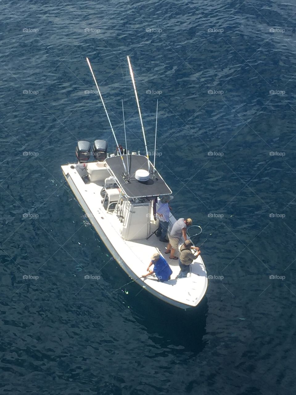 Fisherman fishing 50 miles out into the Gulf of Mexico 