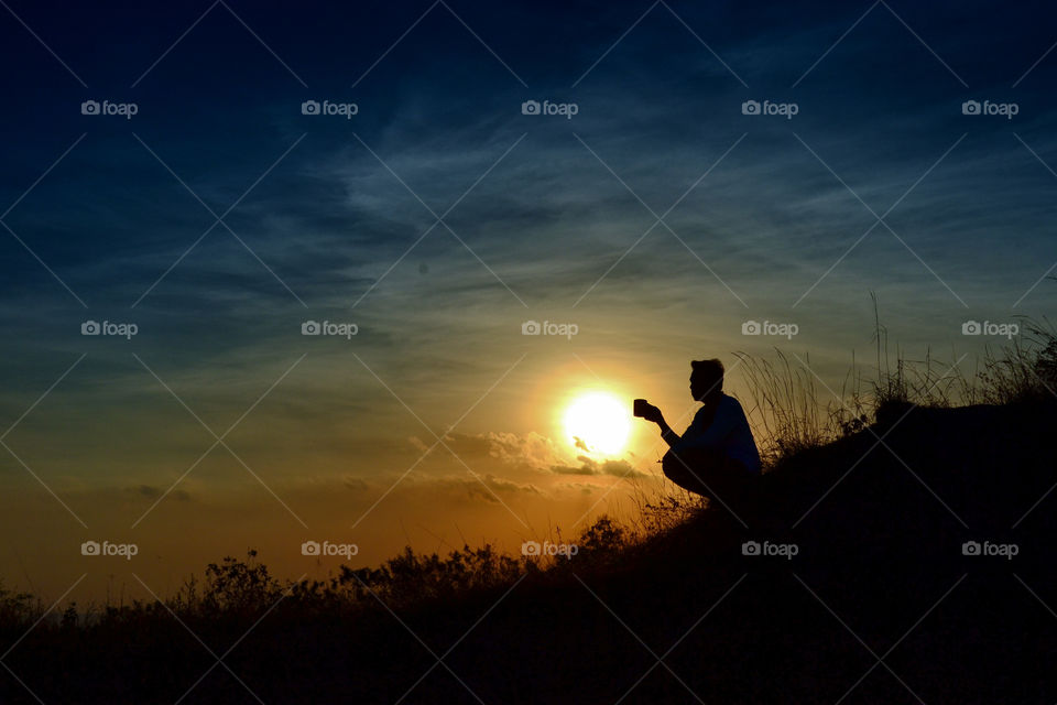 Silhouette of a person during sunset