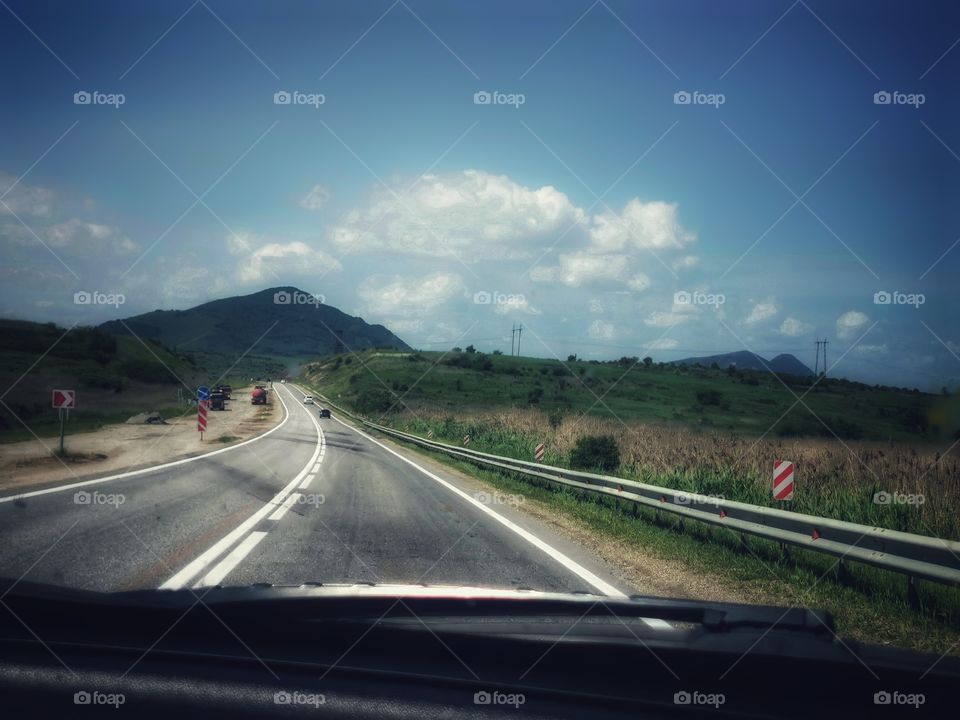 Way road trip outdoor nature greens wild forest sky clouds moody