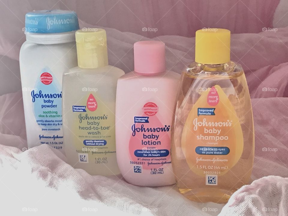 Johnson and Johnson baby products with a soft pink background