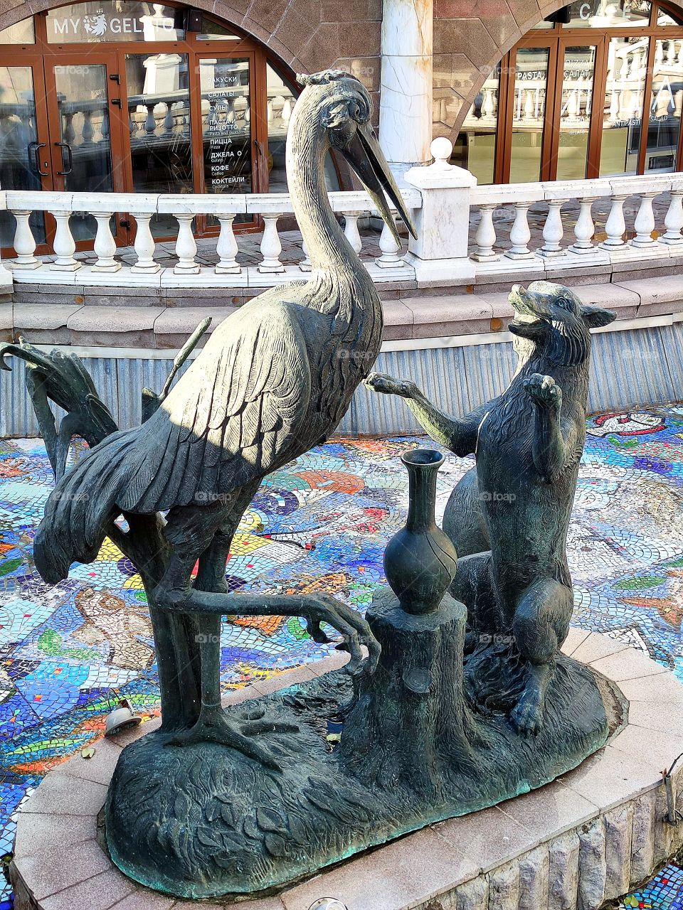 Moscow.  Autumn.  Alexander Garden.  Fountain figures based on Russian fairy tales.  Heron, jug and wolf