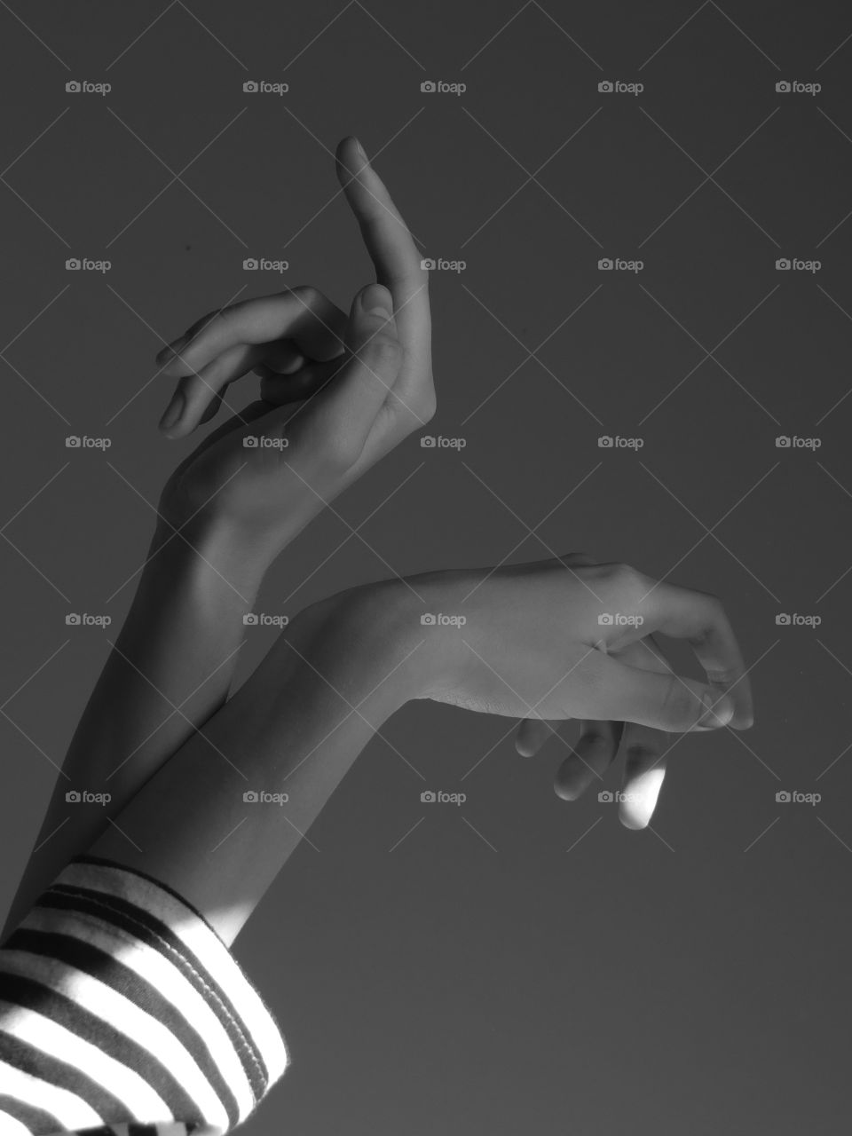 Hands.  Light and shadow