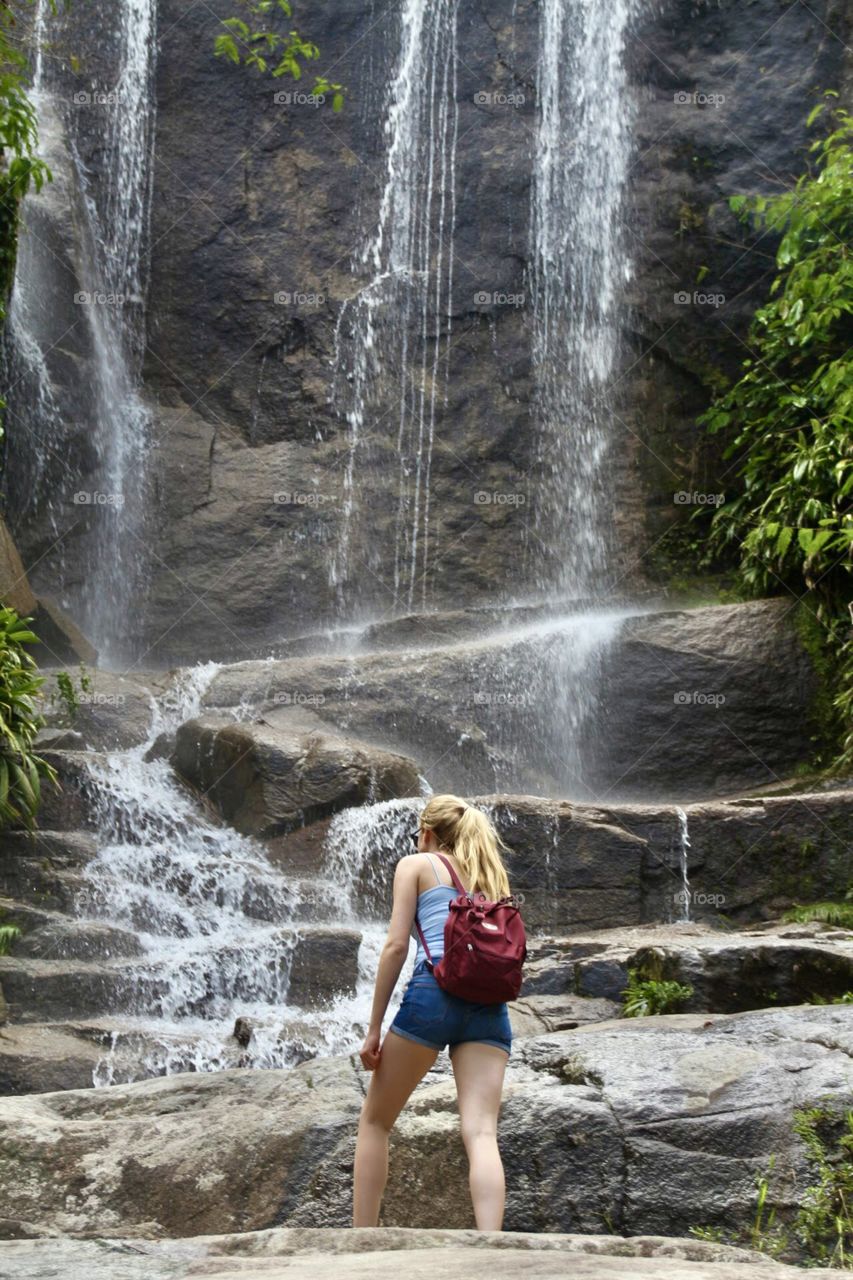 Girl at waterfall 