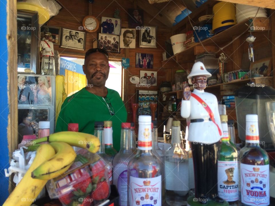 Marshall's Beach Shack. This was our bartender at Marshall's on Junkanoo Beach in the Bahamas