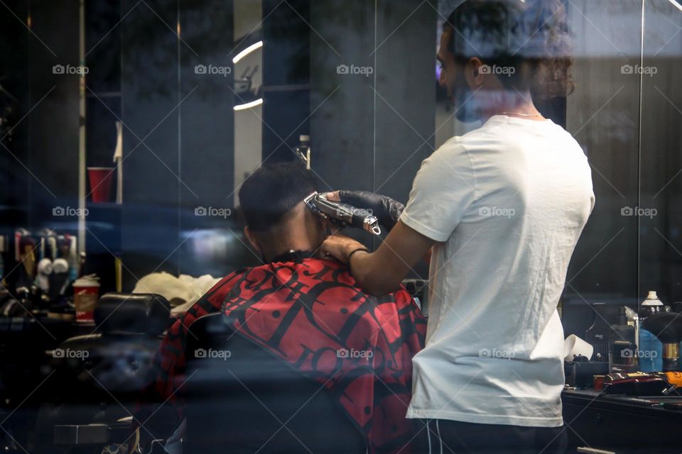 At a stylish barber shop