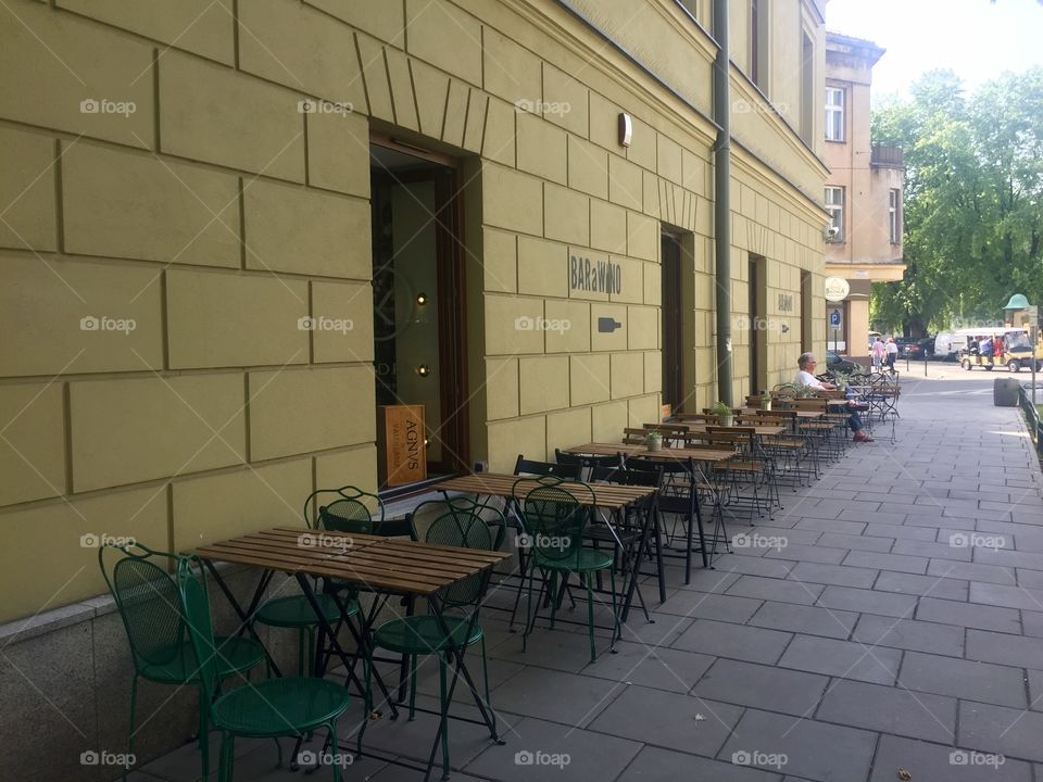 Summer terrace of a wine bar on a street 