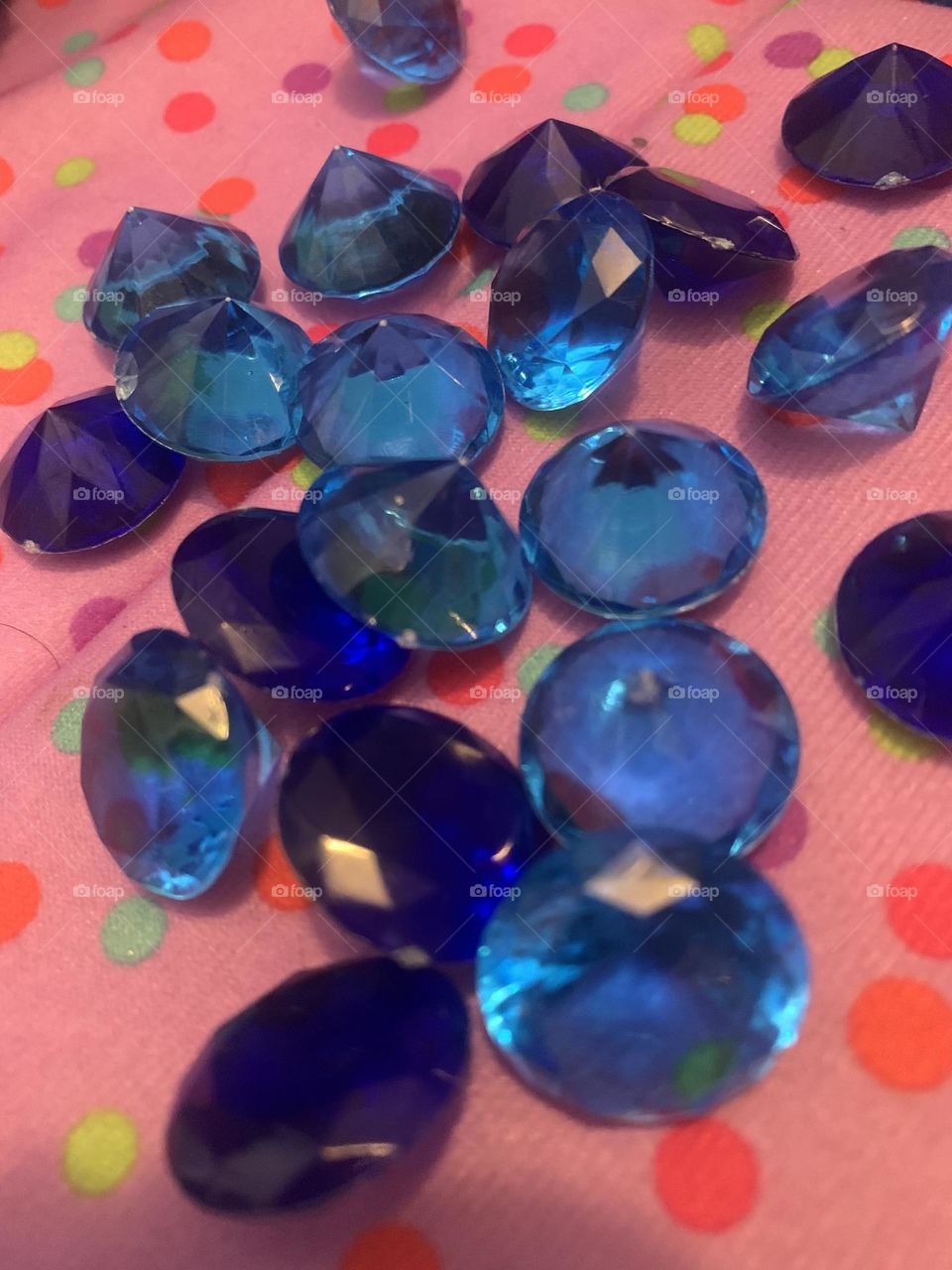 Blue gem stones on polka dots 