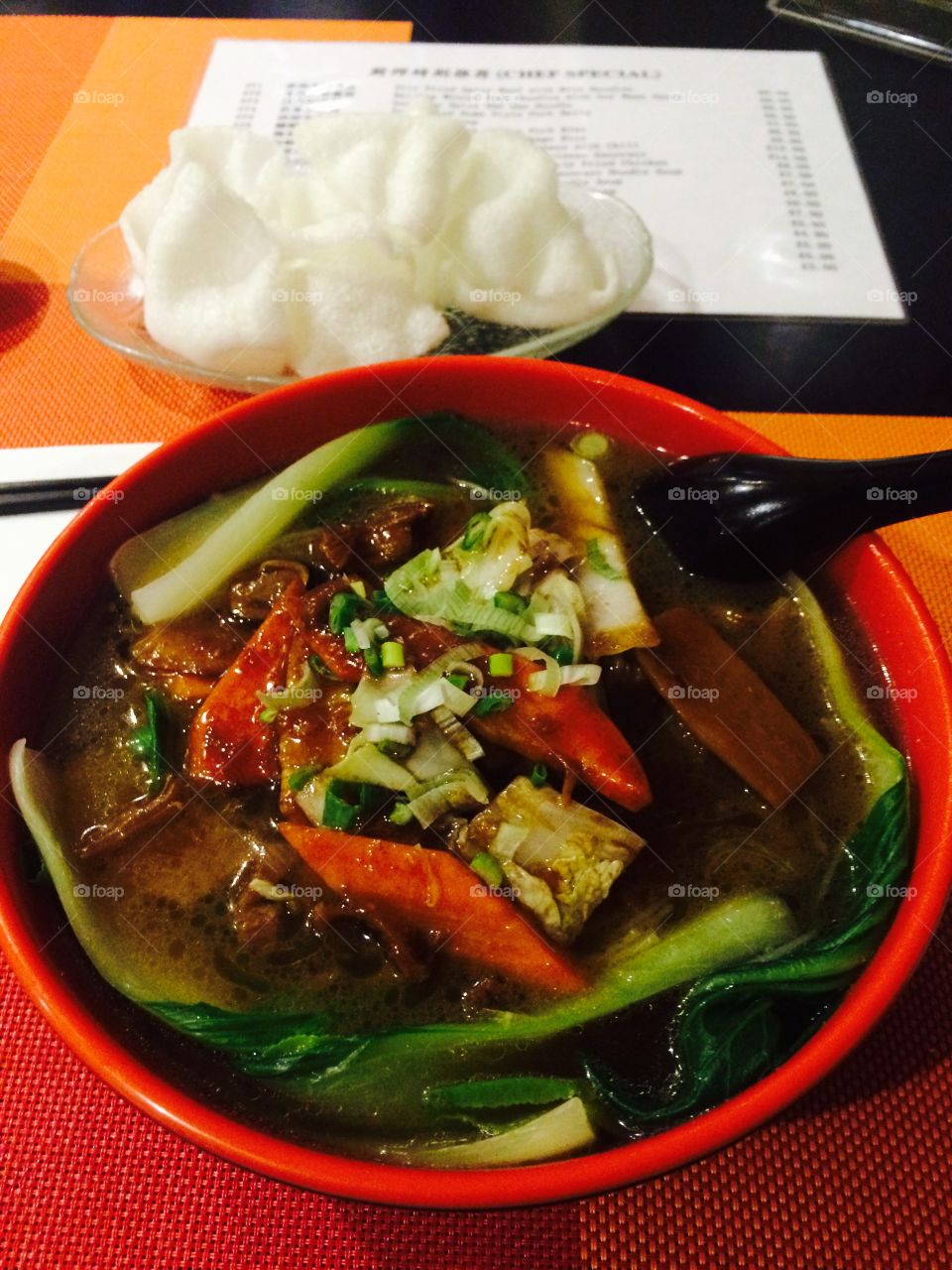 Beef noodle soup with prawn crackers 