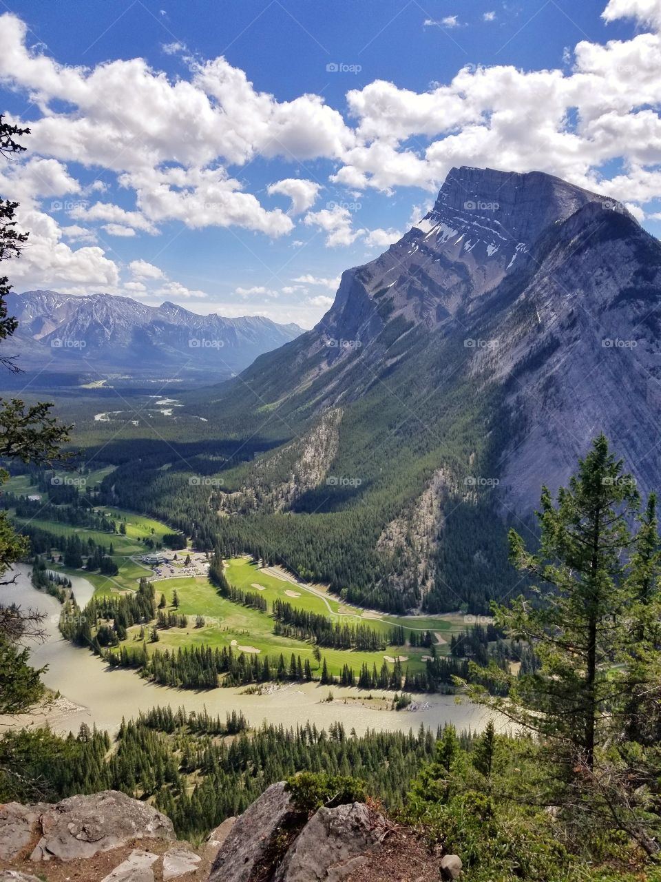 Overlooking Sulphur mountain in Banff Alberta. The golf course in the valley can be seen at the bottom as well as Bow river.