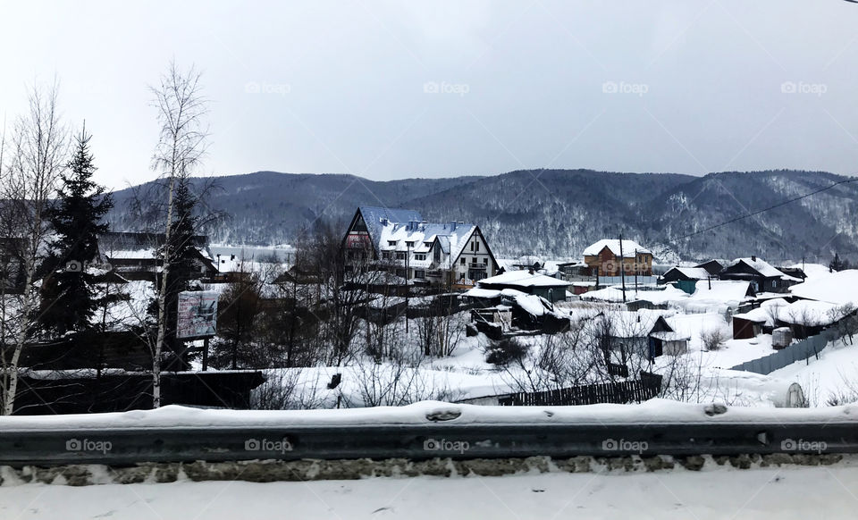 Like a village in Christmas time on card. Surely you don't see the Santa in here because was in March not December in Russia