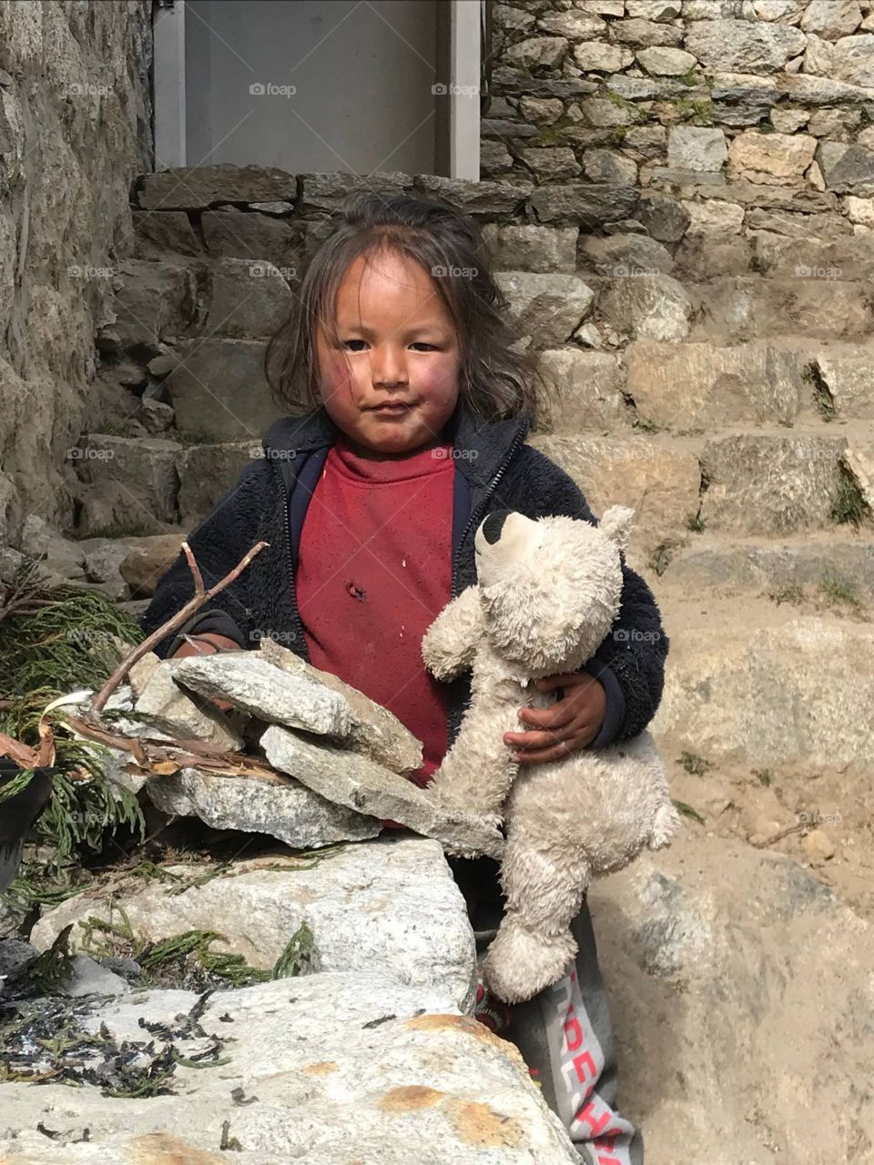 Little boy & his teddy bear in the Himalayas 