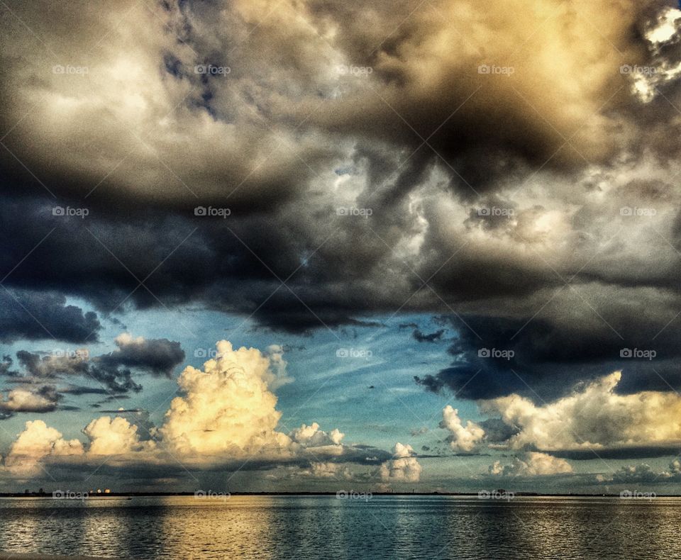 Storm clouds over sea at dusk