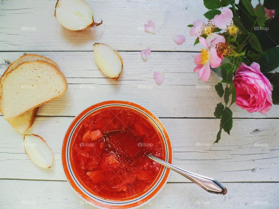 Ukrainian soup and homemade bread on the table