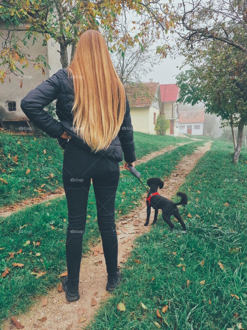 girl walking the dog