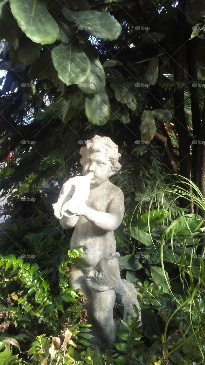 cherub in foliage