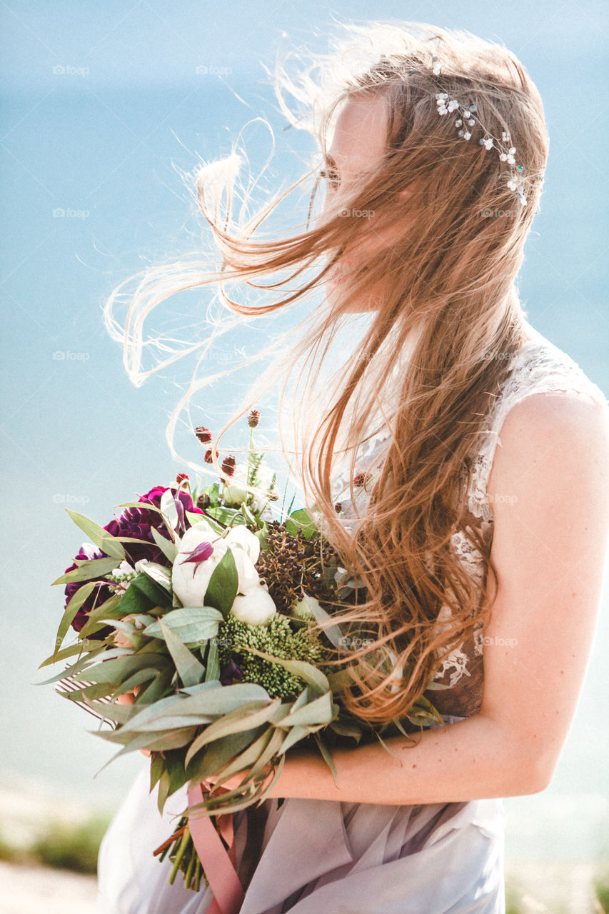 bride's hair and flowers