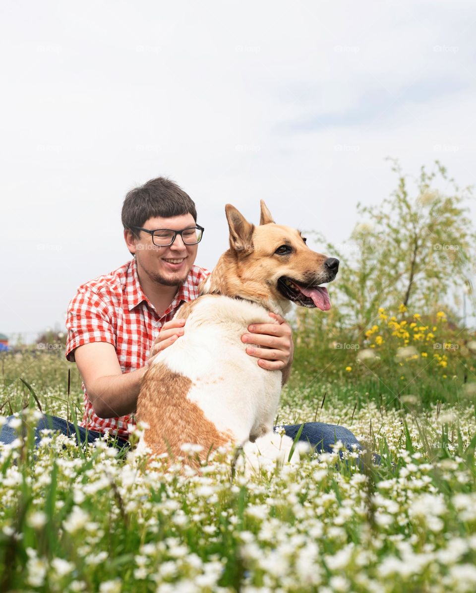 man and dog walking