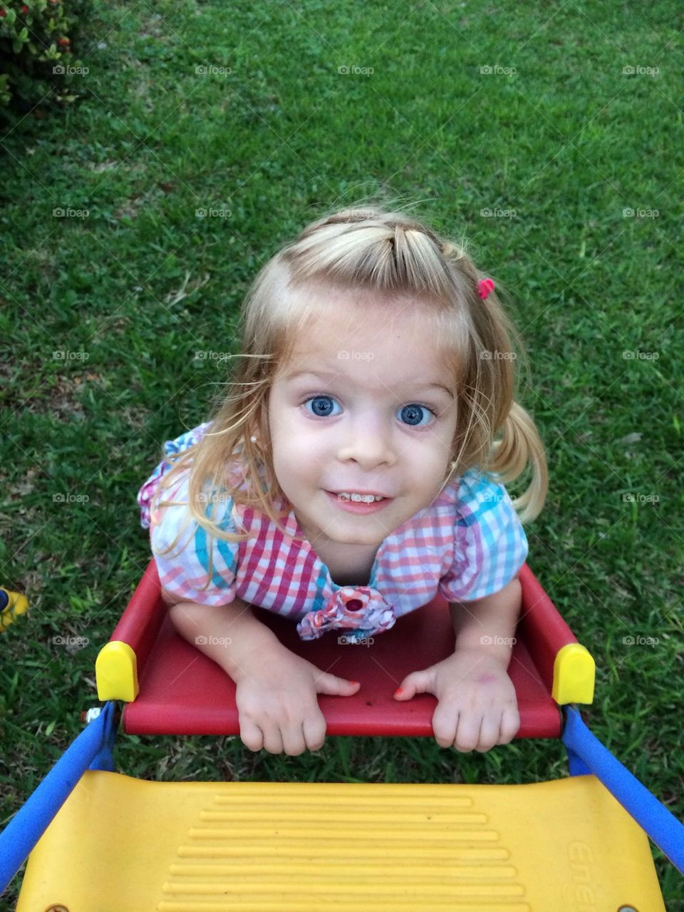 Cute child playing outdoors