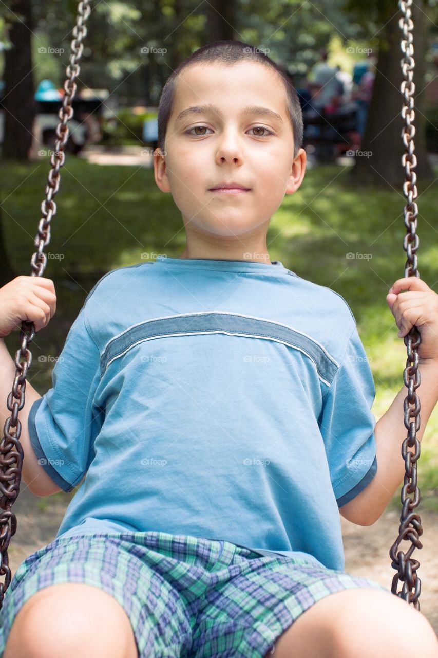 Boy on a swing