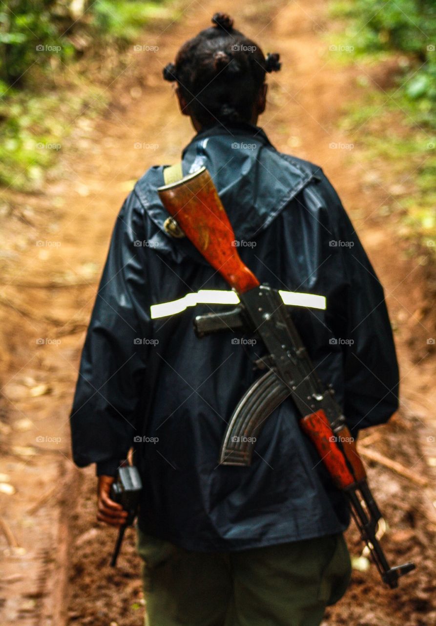 Kalashnikov. This was our guide on a trek to see wild chimpanzees in Uganda.