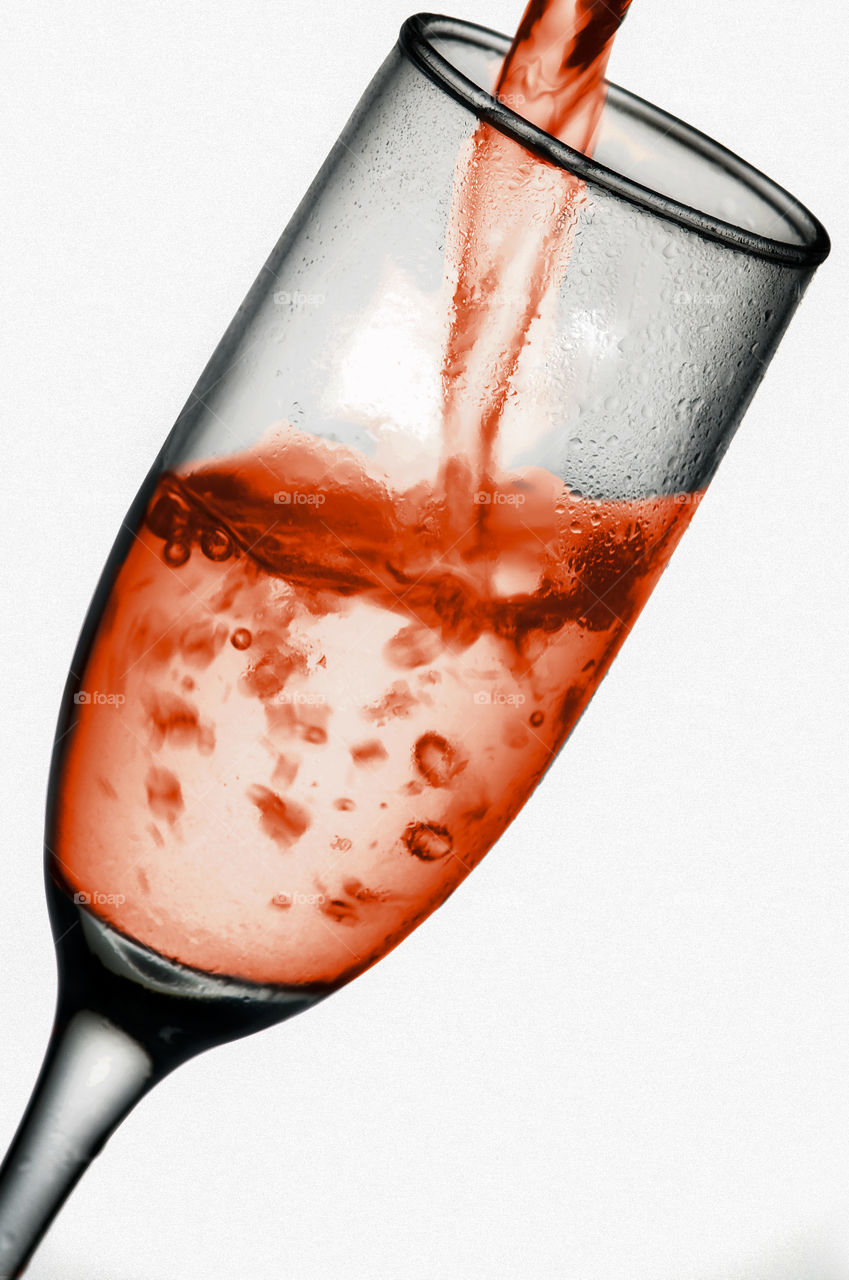 Pink wine on white background
