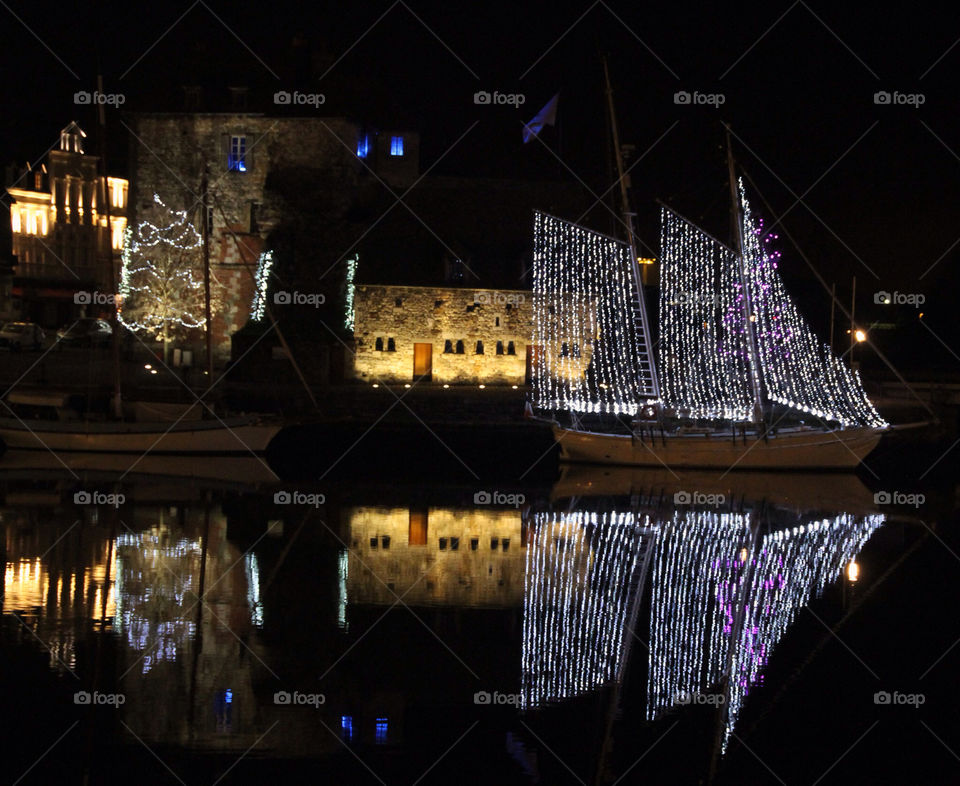 Christmas lights at the old harbour of Honfleur in Normandy France