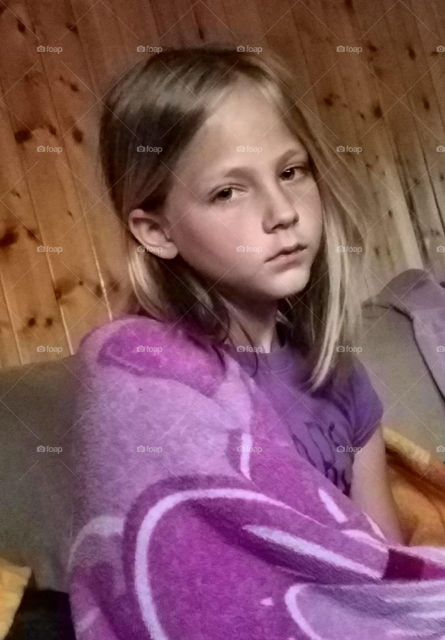 Portrait of girl with blanket