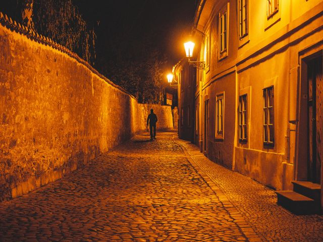 Lonely man walking in the center of Prague