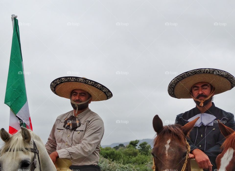 Mexican Pride. Proud Mexican Cowboys On Horseback

