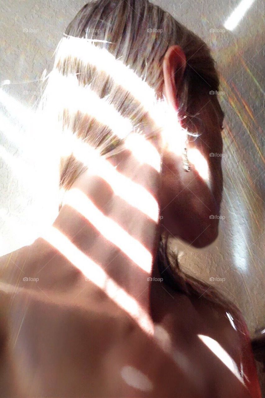 Light rays on bare skin.
