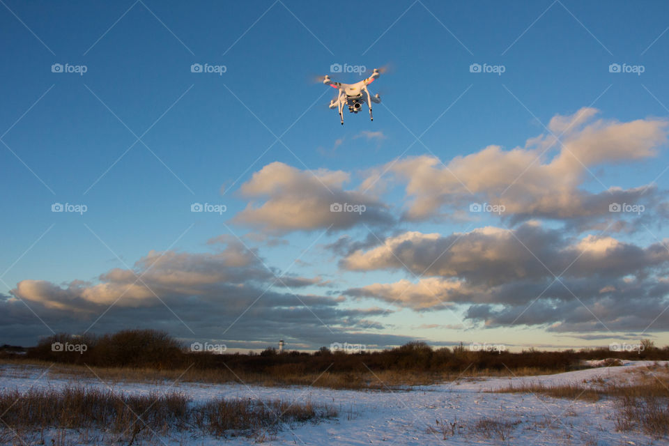 Phantom drone in the air taking pictures.