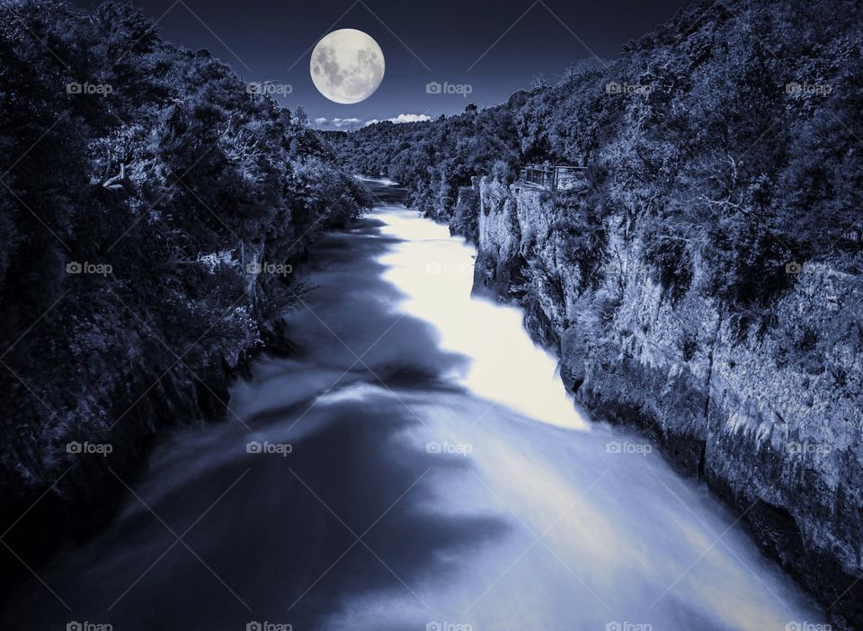 Full moon over the Huka Falls in Rotorua New Zealand- long exposure. 