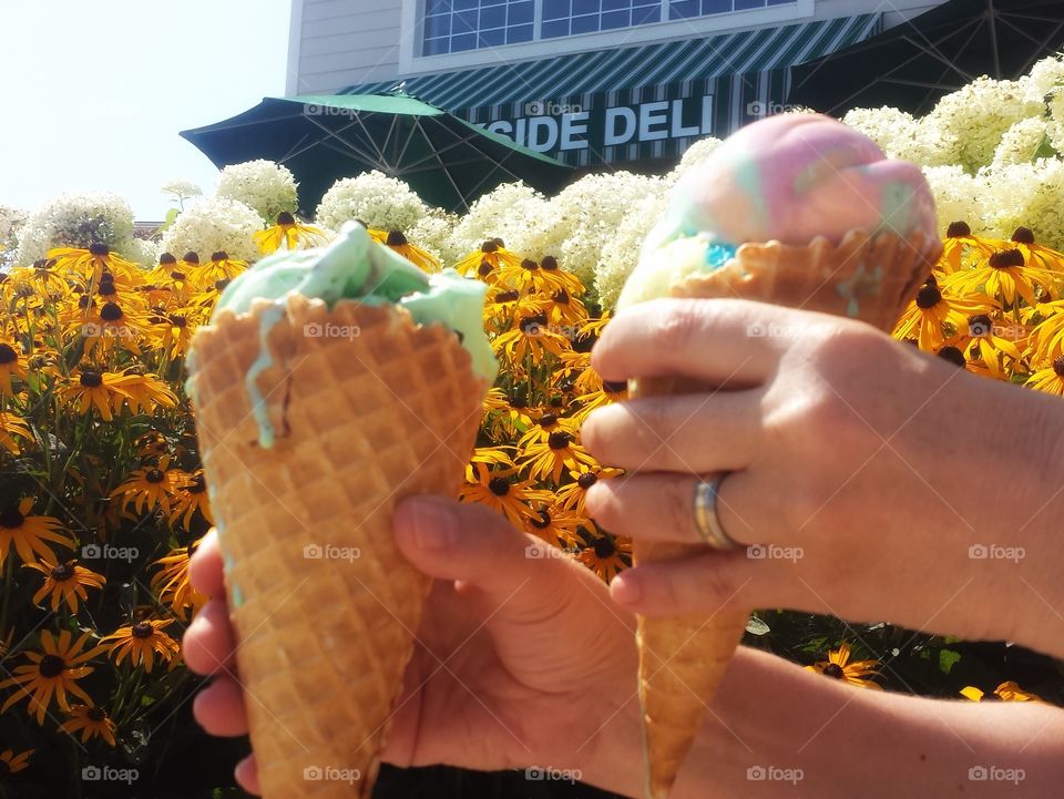 Hands Holding Ice Cream