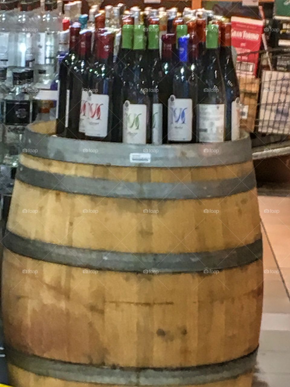 Wine bottles on barrel