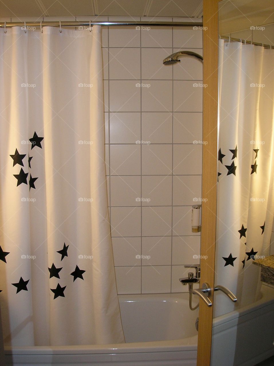 Bathroom with open curtain in stars 