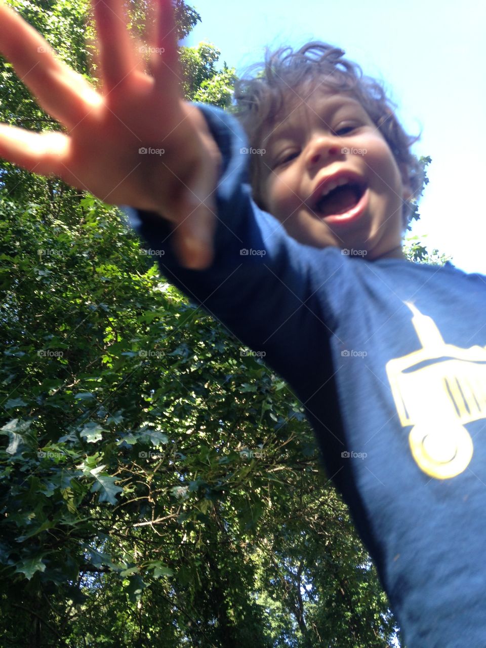 Happy Toddler. My 2-yr-old playing outside.