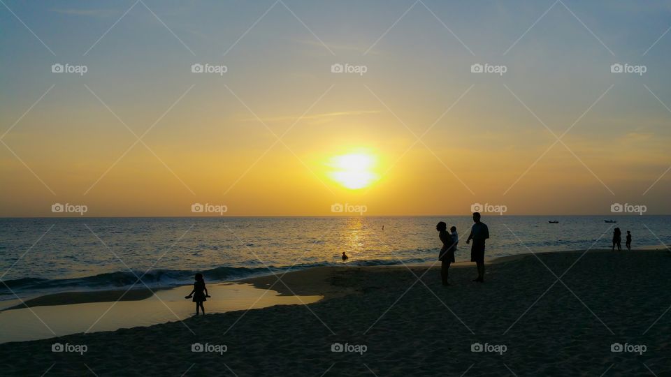 sunset family crash boat  beach