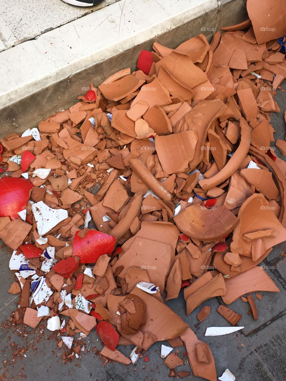 Smashed clay pots after Greek Easter Saturday celebration, Corfu Town, Greece