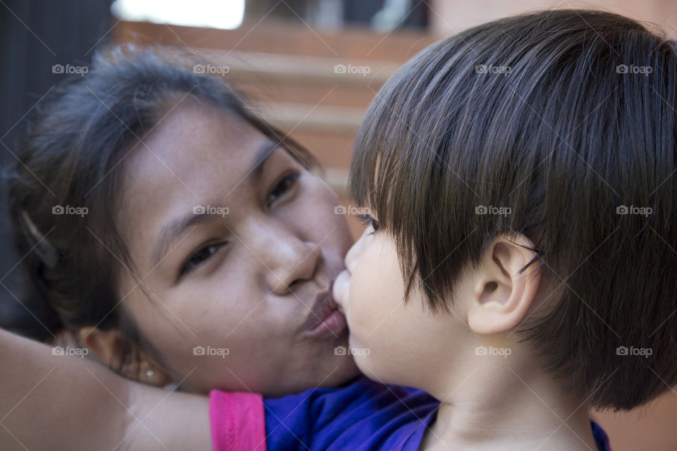 kiss of love between mother and son