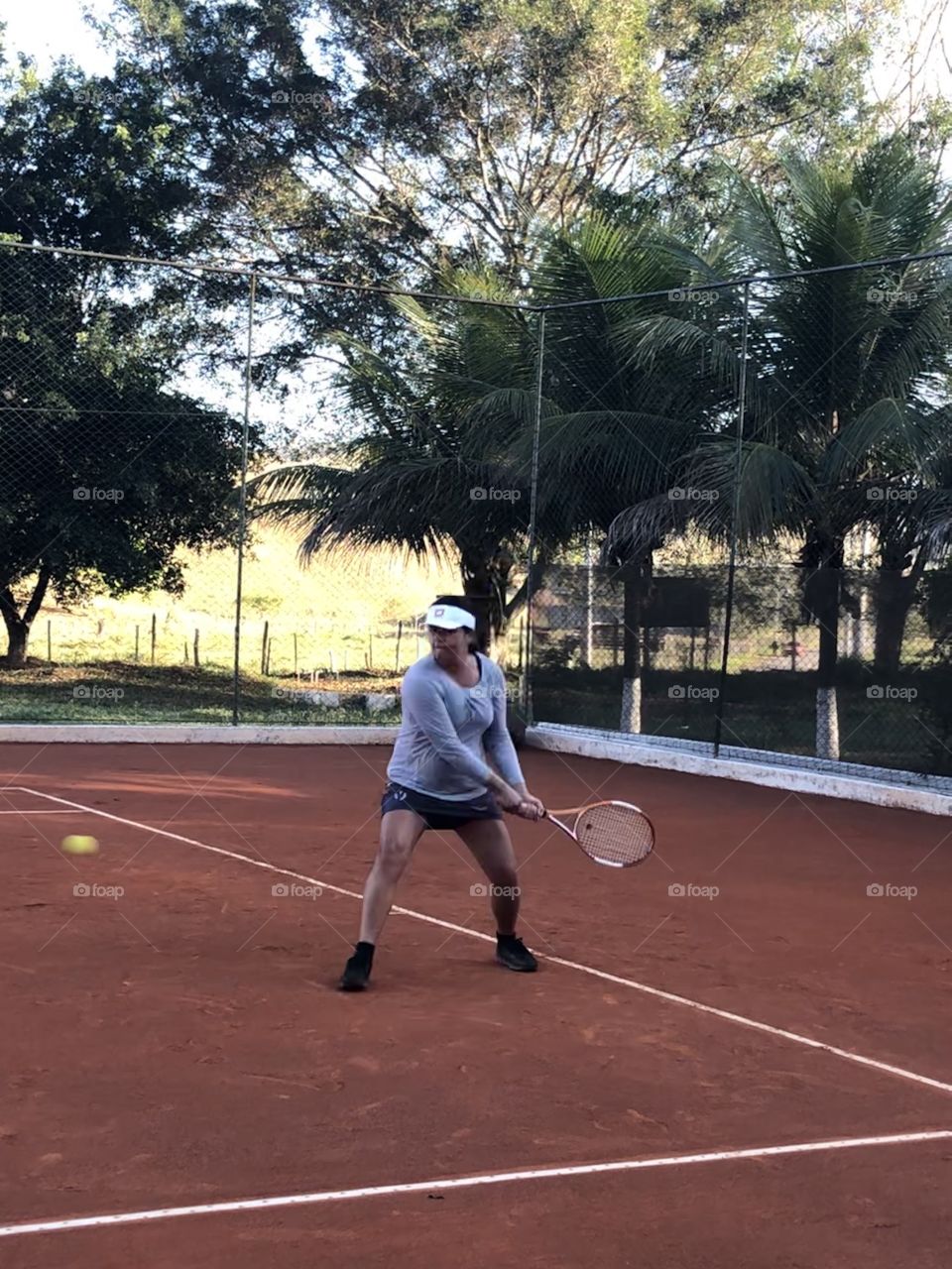 Pronta pra bater na bola. 🎾