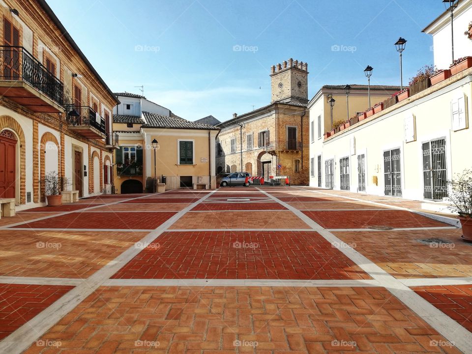 Geometric and symmetrical square in the historic center of Spoltore in Italy