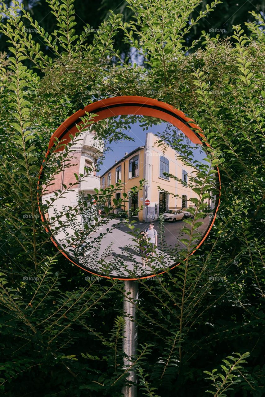 Portrait in a mirror. Summer travels in Italy.