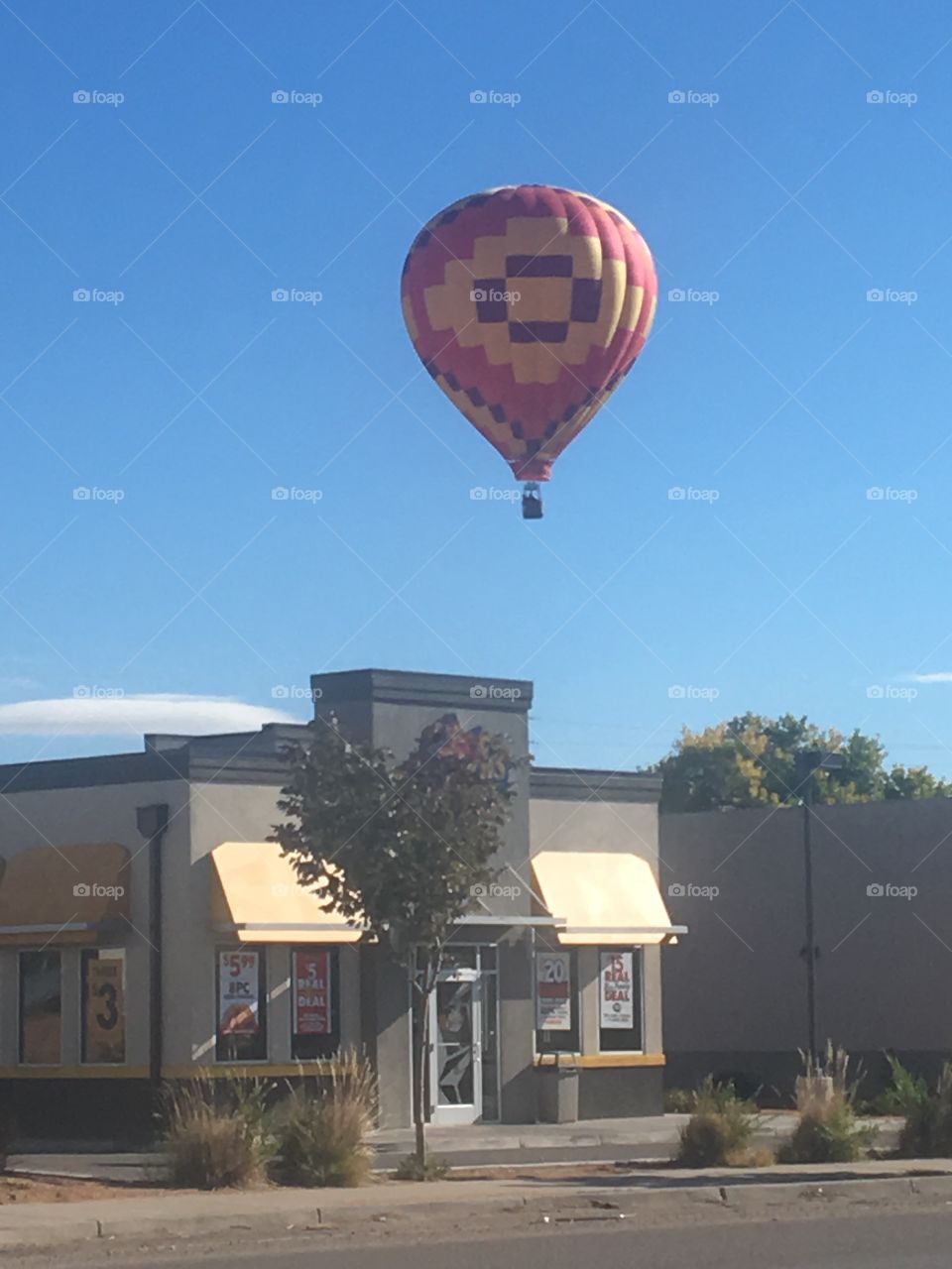 Hot-Air Balloon Flying High over Albuquerque
