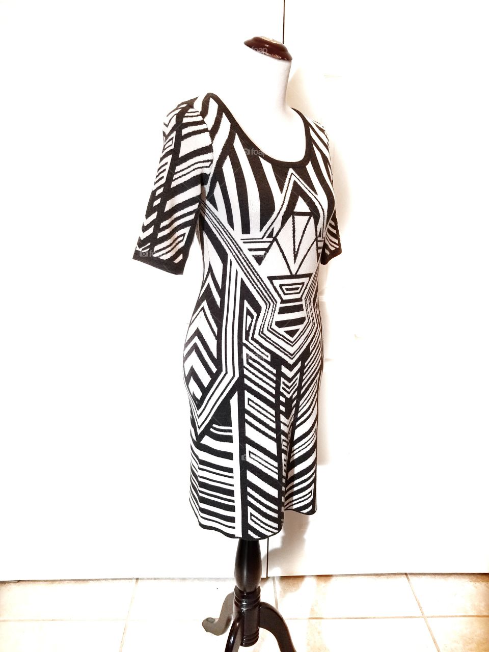 Pattern Sweater Dress in a Geometric Black and White Print.