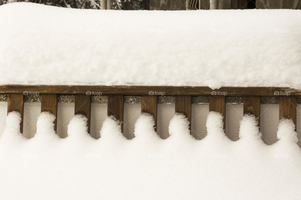 Snow over the fence