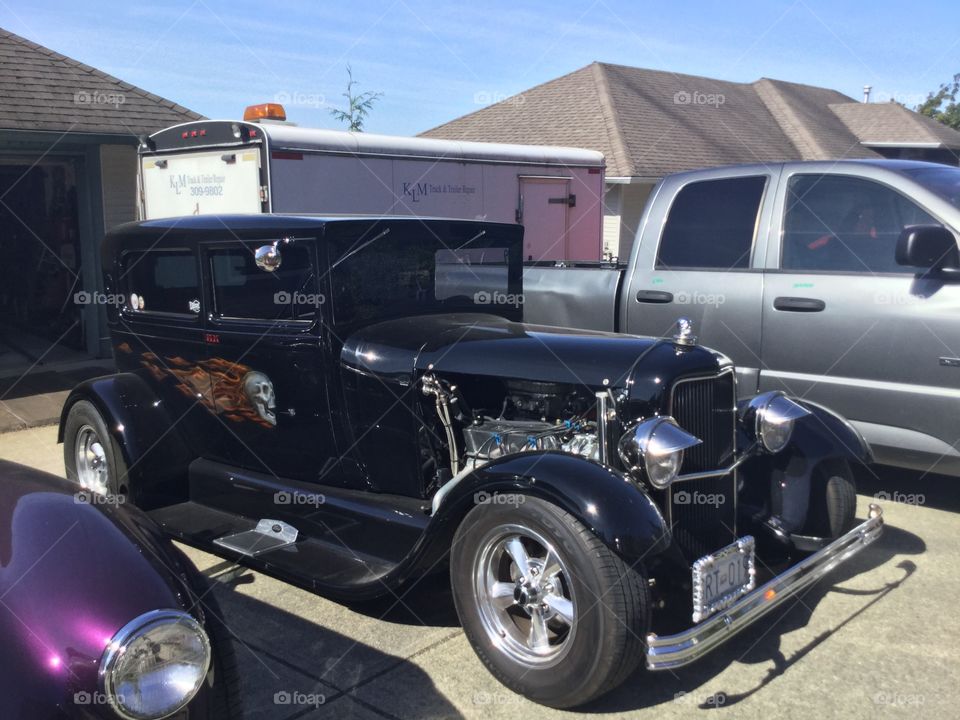 Vintage Hotrod in a driveway 